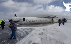 Canada : les images de l'atterrissage sur le dos d'un avion de ligne à Toronto, au moins 15 blessés