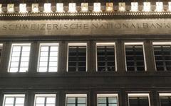 Suisse: La BNS maintient ses taux négatifs, prête à agir pour le franc